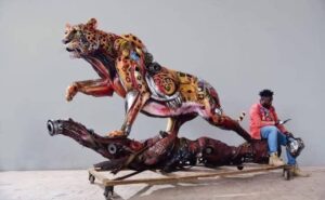 IMG-20251223-WA0067-300x185 Meet Dotun Popoola; Turning Waste into Artwork