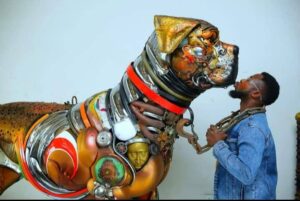 IMG-20251223-WA0068-300x201 Meet Dotun Popoola; Turning Waste into Artwork